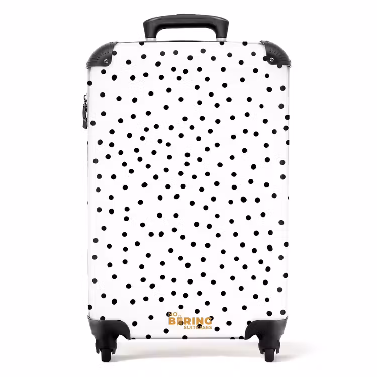 Valise - Des points noirs pleuvent sur une surface blanche — 1