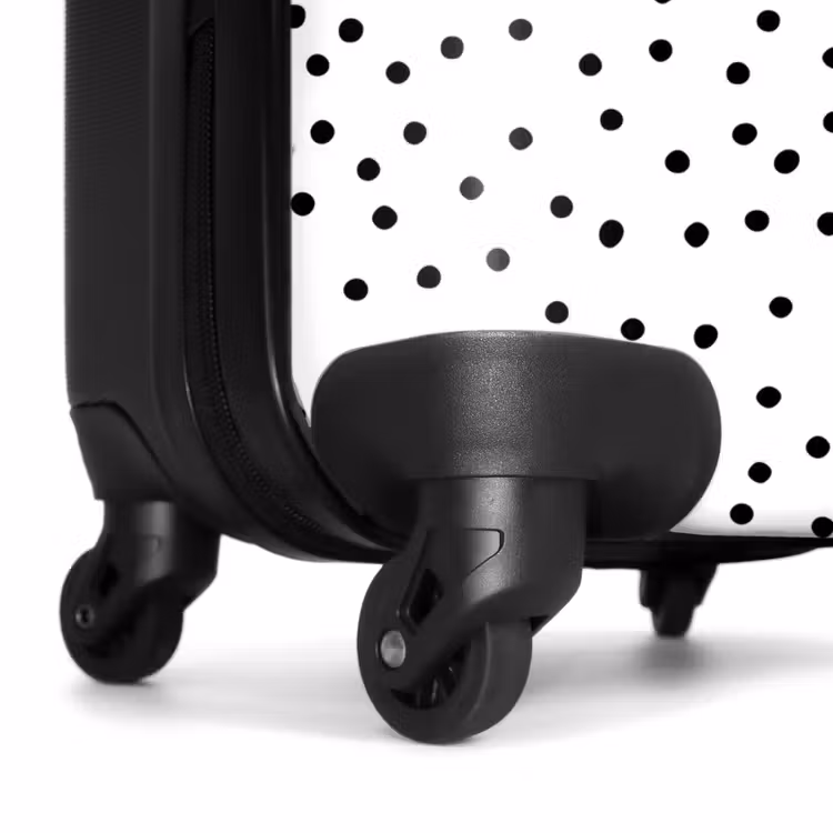 Valise - Des points noirs pleuvent sur une surface blanche — 7
