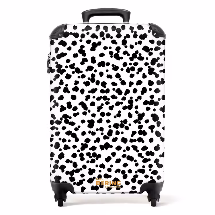 Valise - Points noirs en forme de brosse sur fond blanc. — 1