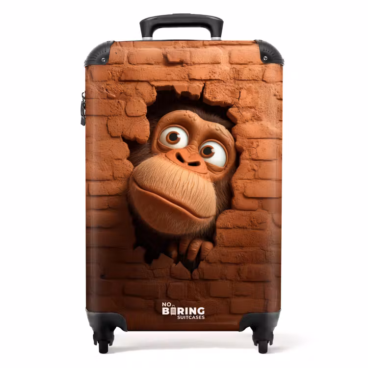 Valise - Un singe aux grands yeux regarde à travers un trou dans un mur de briques — 1
