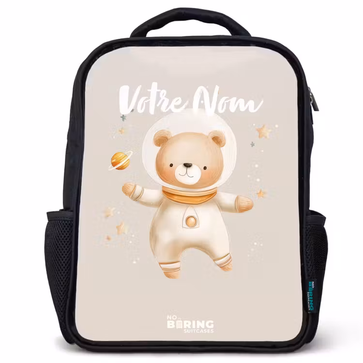 Sac à dos enfant - Noir - Un ours spatial beige flotte parmi les étoiles — 1